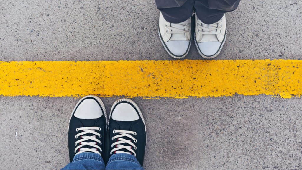 feet on a street border